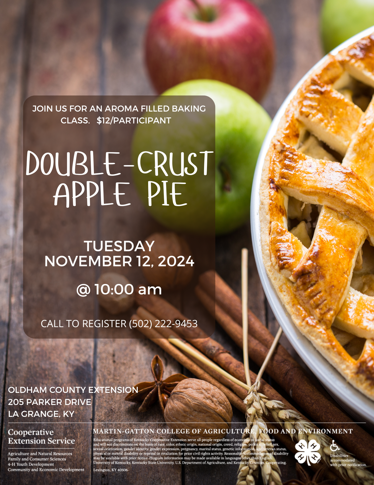 Apple pie on wood table with apples and cinnamon